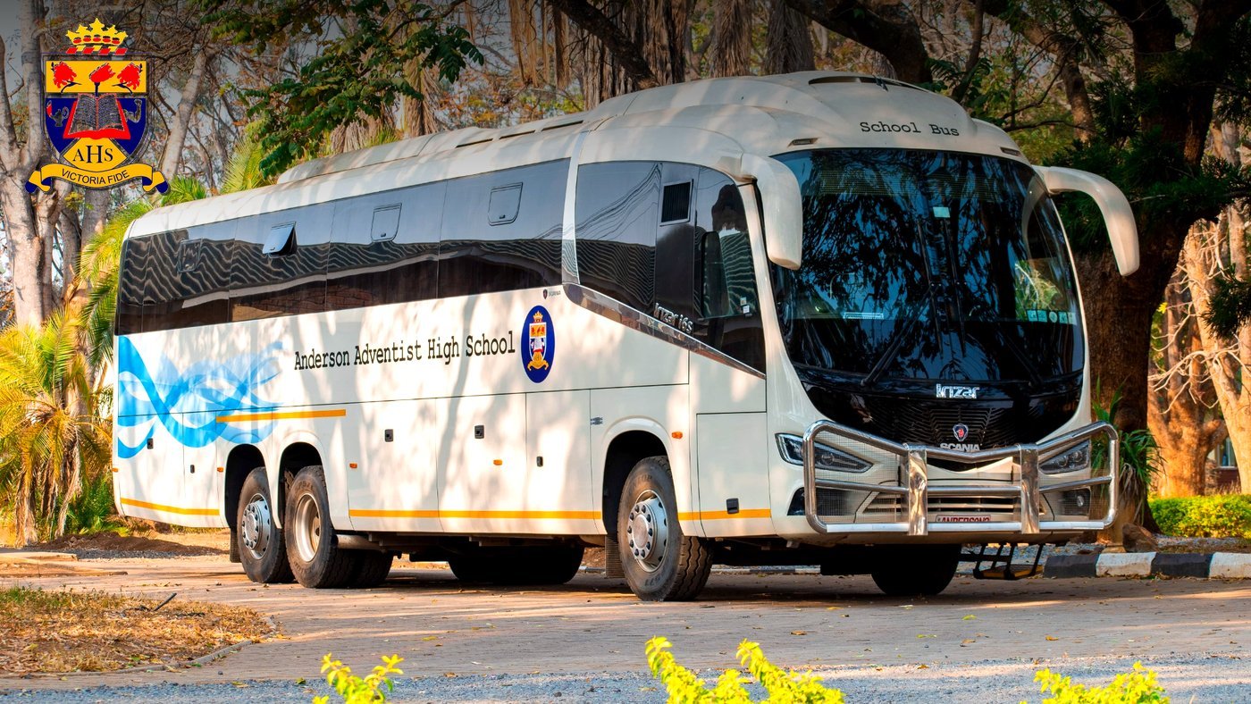 Anderson Adventist School bus with logo